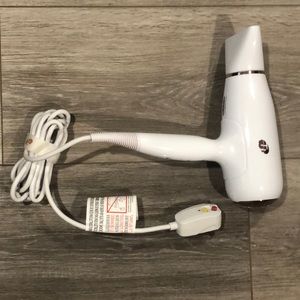 T3 White and Rose gold blow dryer. Never actually used, but no box. Model 76800